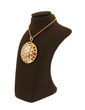 Flower of Life inspired domed pendant
